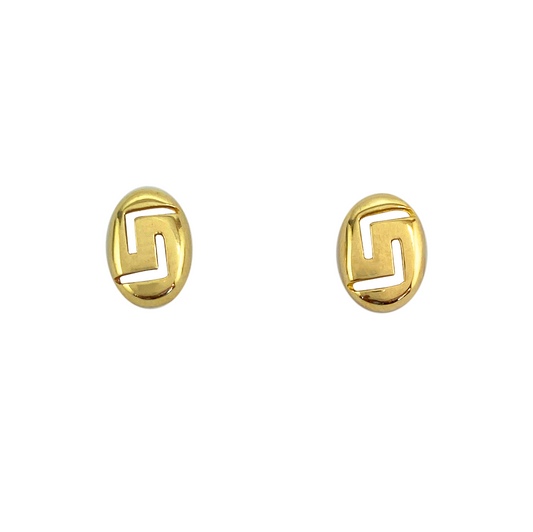 Pair of gold stud earrings featuring a Greek key motif cut out from the center of each circular earring.