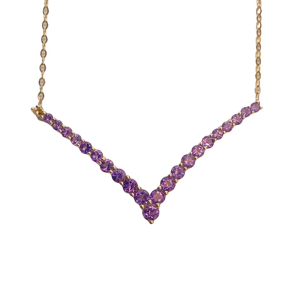 V-shaped necklace with purple amethyst stones set in gold.