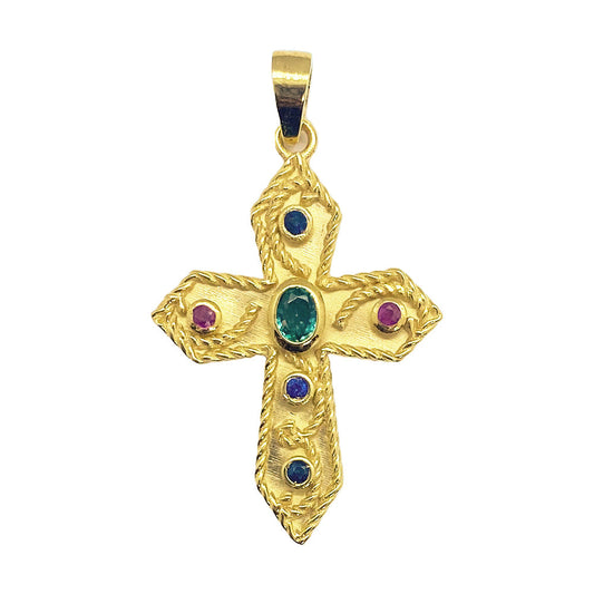 Gold cross pendant with a center gemstone on a white background