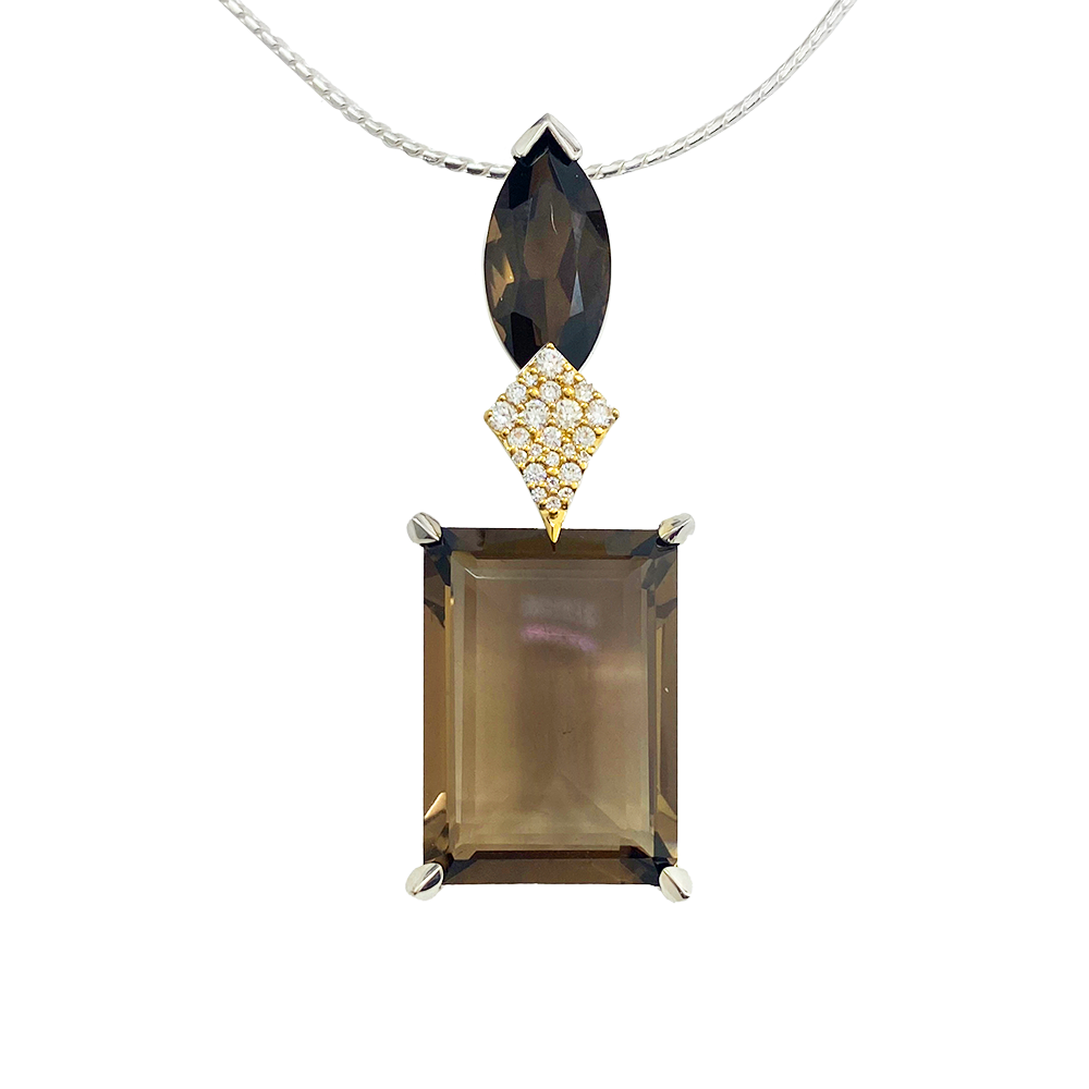 Silver necklace featuring a large rectangular smoky quartz gemstone, accented by a smaller pear-shaped smoky quartz and a diamond-studded square pendant.