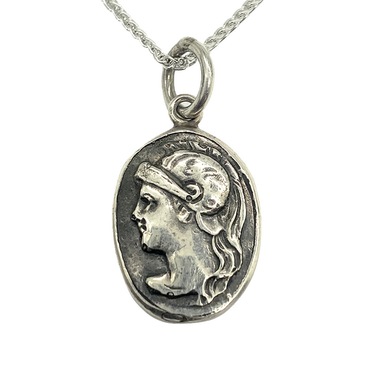 Silver pendant featuring the profile of Athena