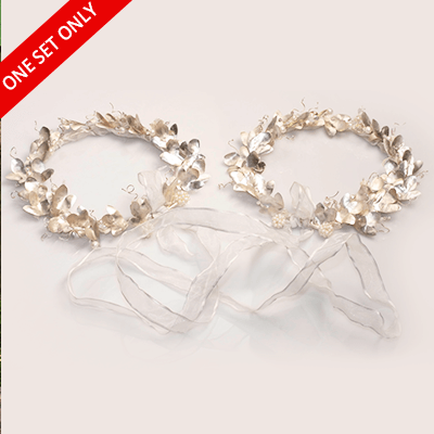 Pair of silver-plated leaf headbands adorned with faux pearls and a white ribbon tie.