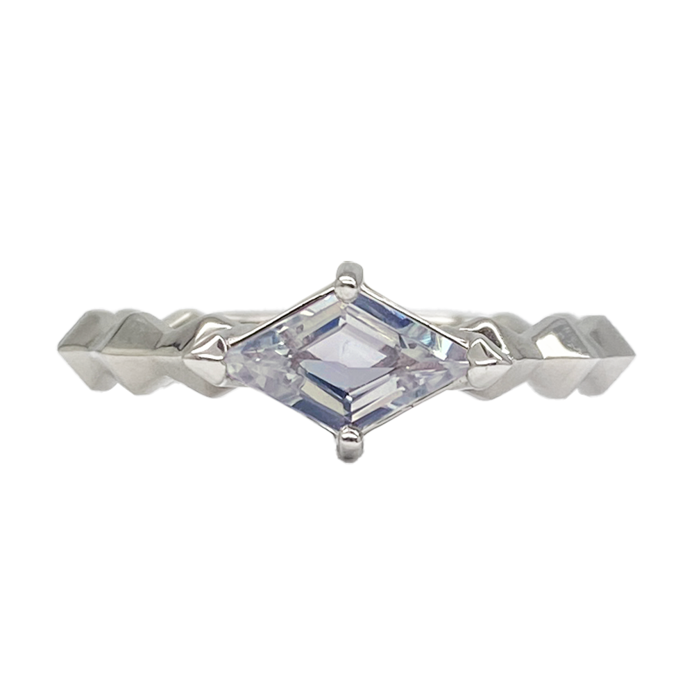 Silver ring featuring a radiant-cut center stone