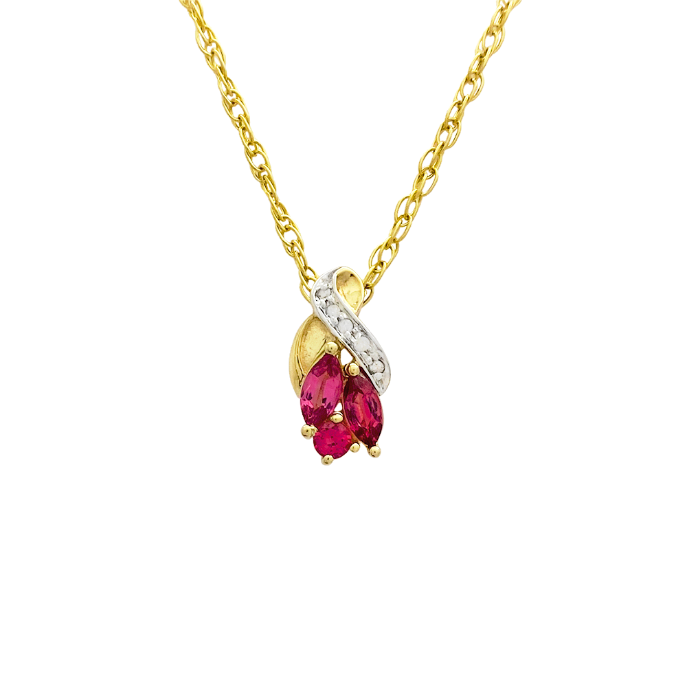 Gold chain necklace with a marquise-shaped ruby pendant accented by smaller diamonds.