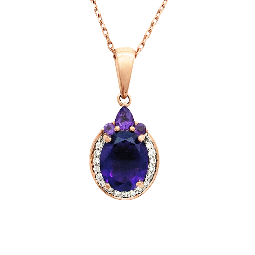 Rose gold pendant with a large oval amethyst center stone, surrounded by smaller diamonds