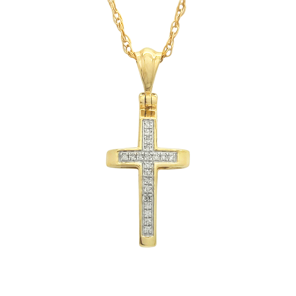 Gold cross pendant with multiple small diamonds set in a pave setting.