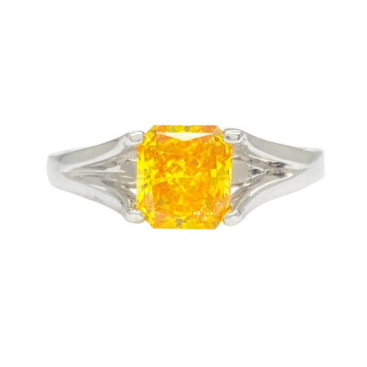 Silver ring yellow gemstone in split-shank design.