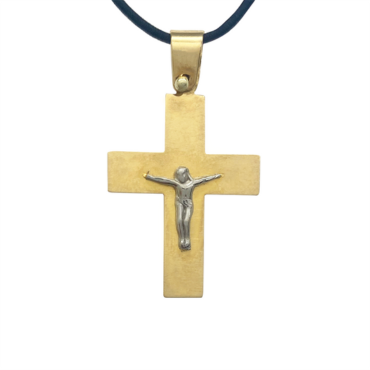 Gold cross pendant on a whte background