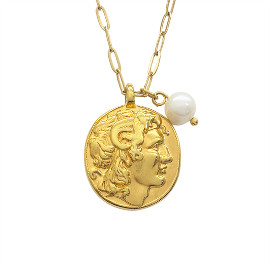 Gold chain necklace with a circular pendantand single pearl 