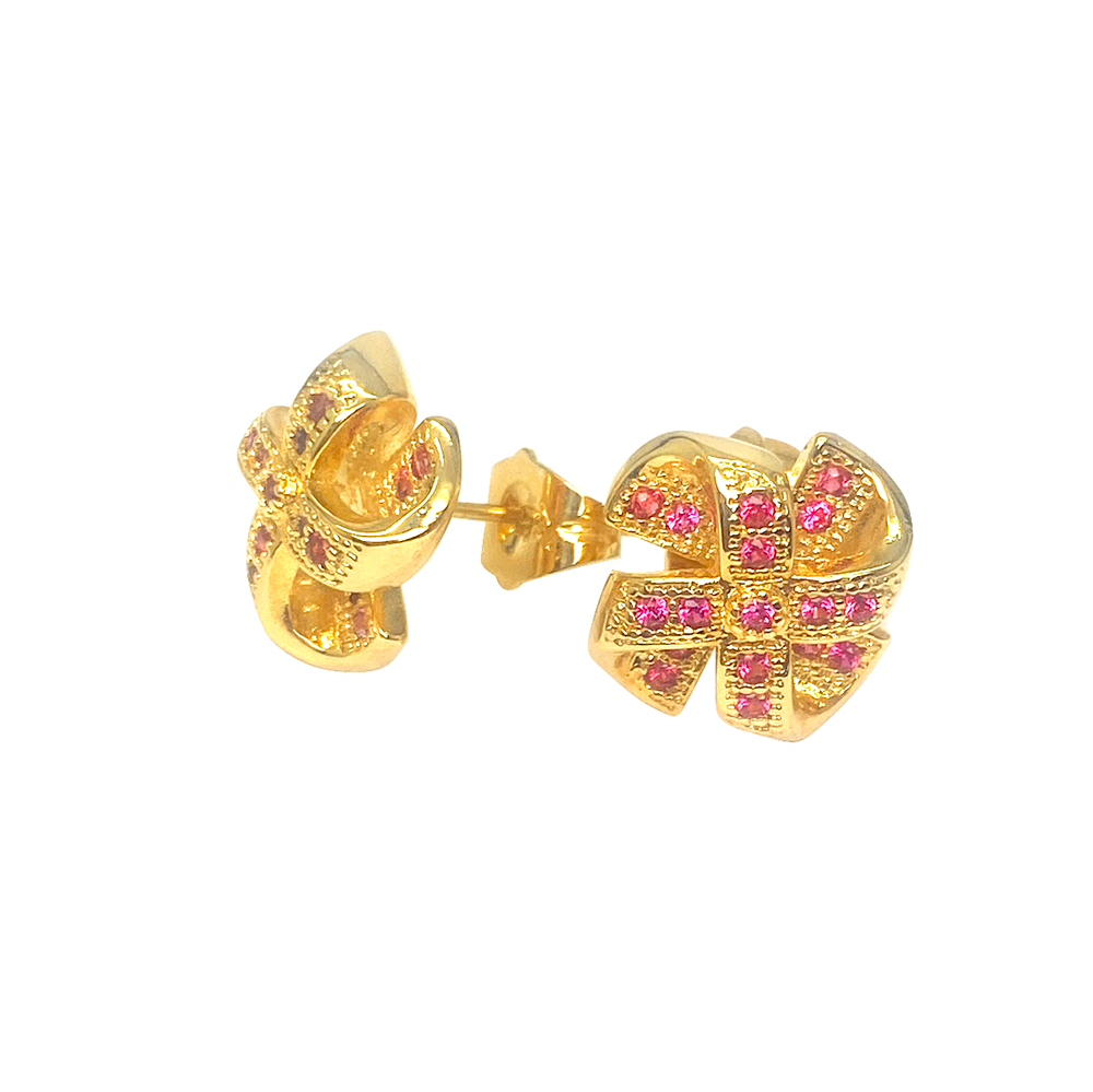 Gold bow-shaped stud earrings with pink stones.