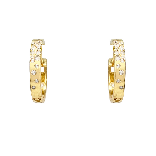 Yellow gold hoop earrings with diamond accents, on a white background