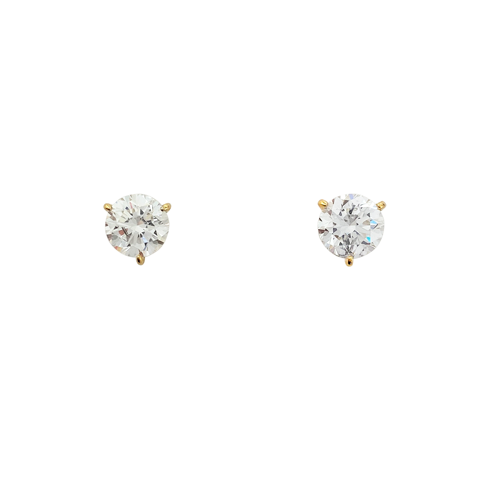 Pair of gold stud earrings with round cut diamond.