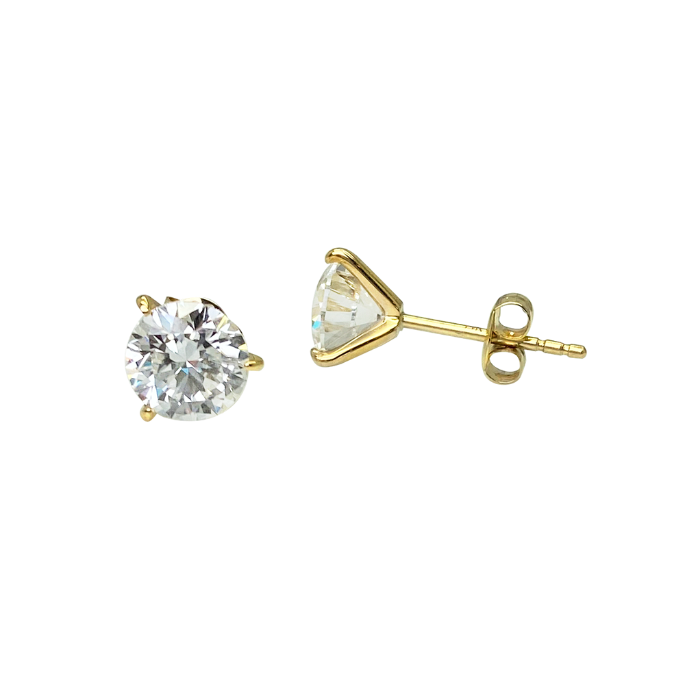 Pair ofgold stud earrings with round cut diamond.