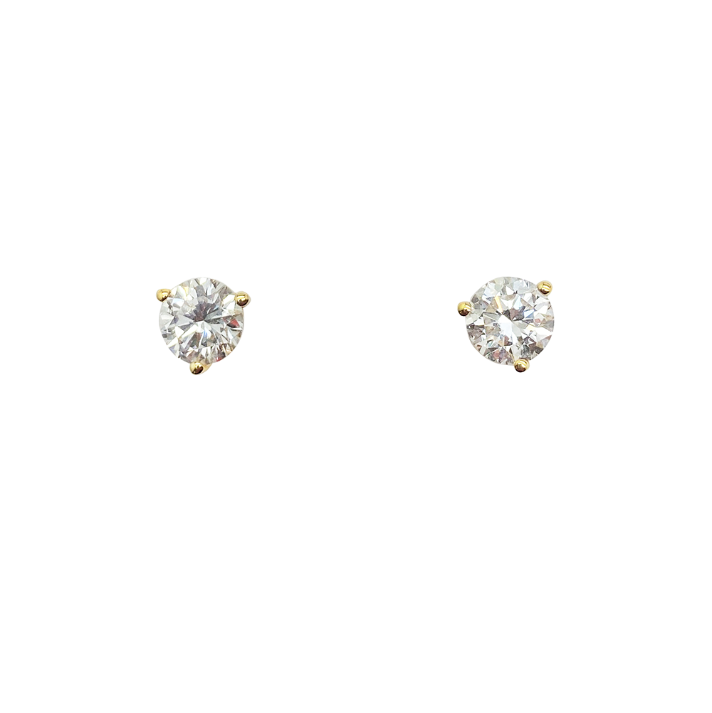 Pair ofgold stud earrings with round cut diamond.