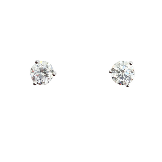 White gold stud earrings with round-cut diamonds, on a white background