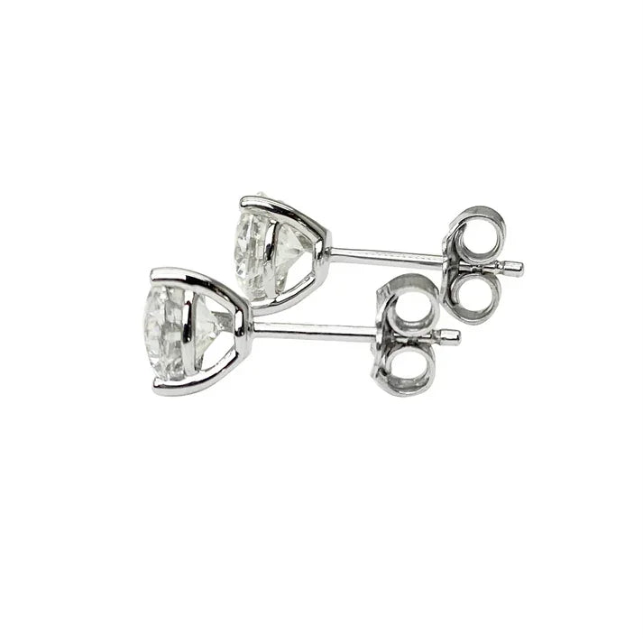 White gold stud earrings with round-cut diamonds, on a white background