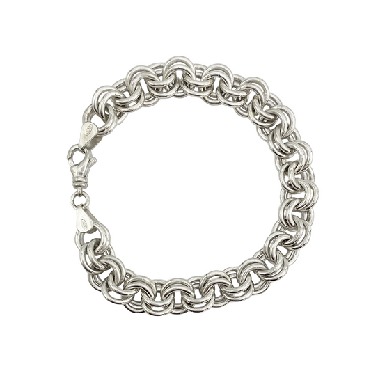 Silver chain link bracelet on a white background.