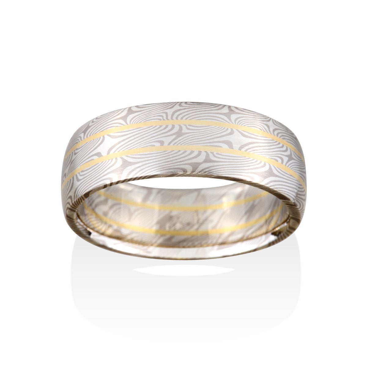 Damascus steel band ring on a white background