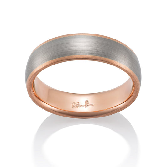 Rose gold ring with a brushed finish on a white background