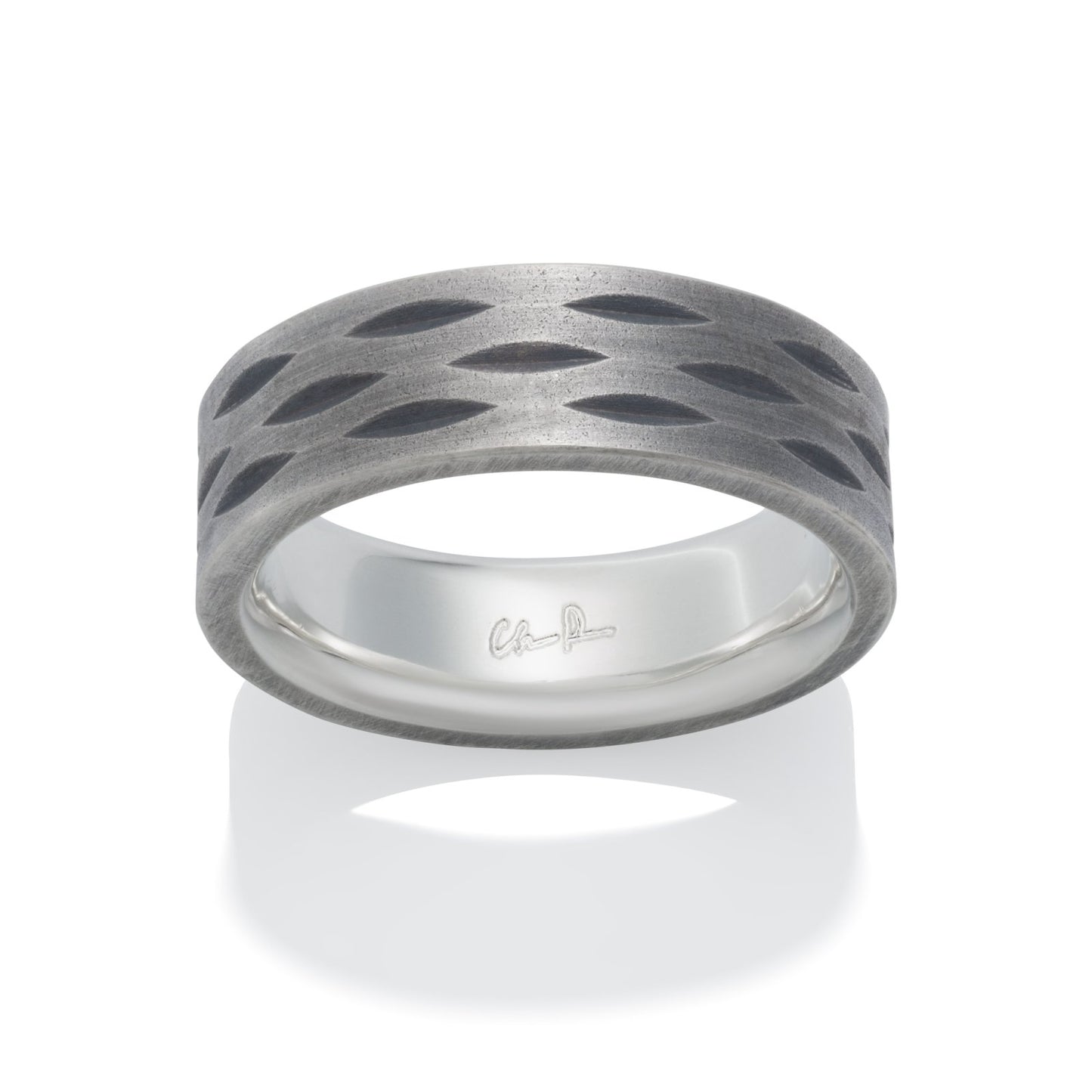 Dark gray silver ring with a textured, grooved pattern, resembling a woven design, on a white background.