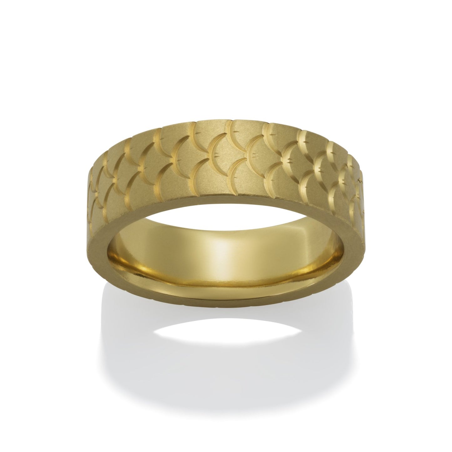 Gold ring with a textured, fish-scale pattern on a white background.