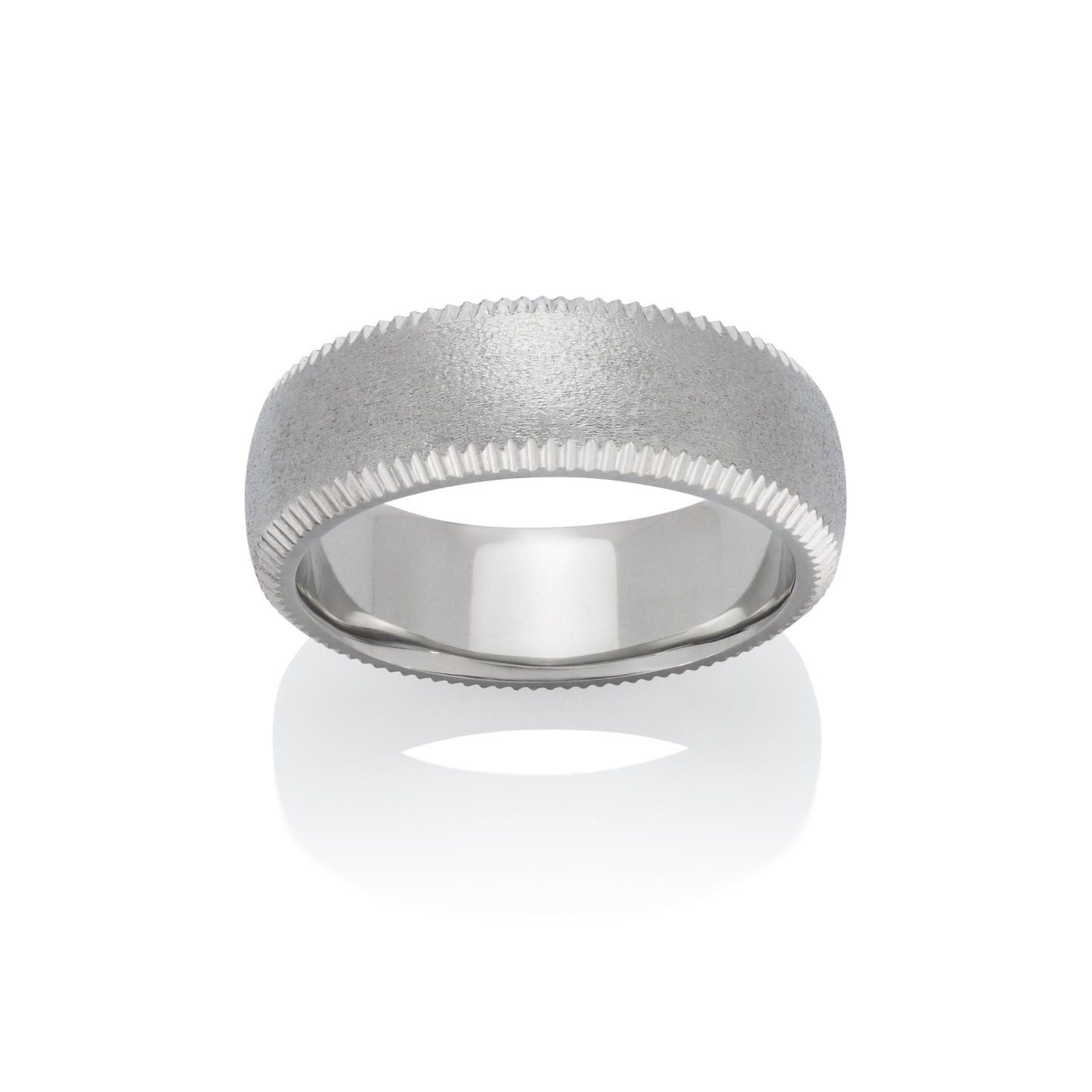 Silver ring with a textured, brushed finish and a serrated edge on a white background.