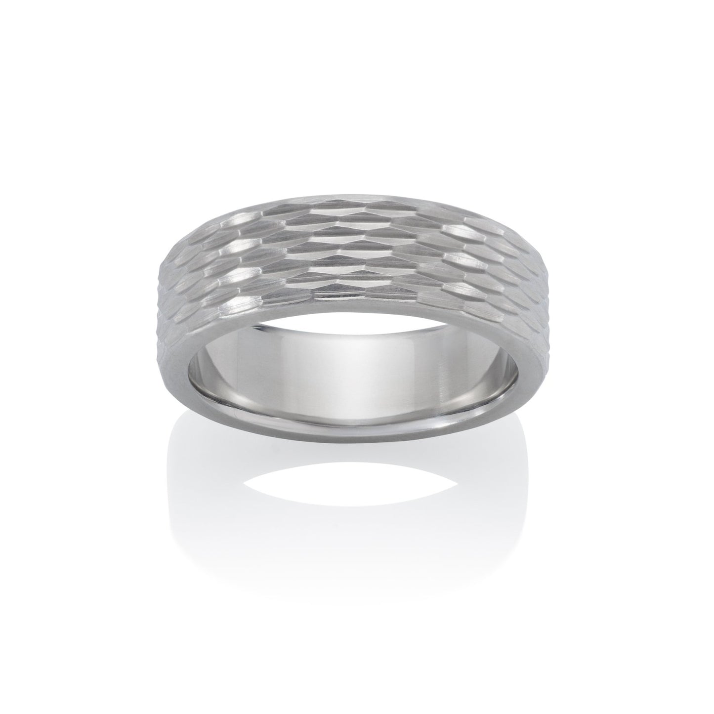 Silver ring with a textured, geometric pattern resembling scales or a honeycomb, on a white background