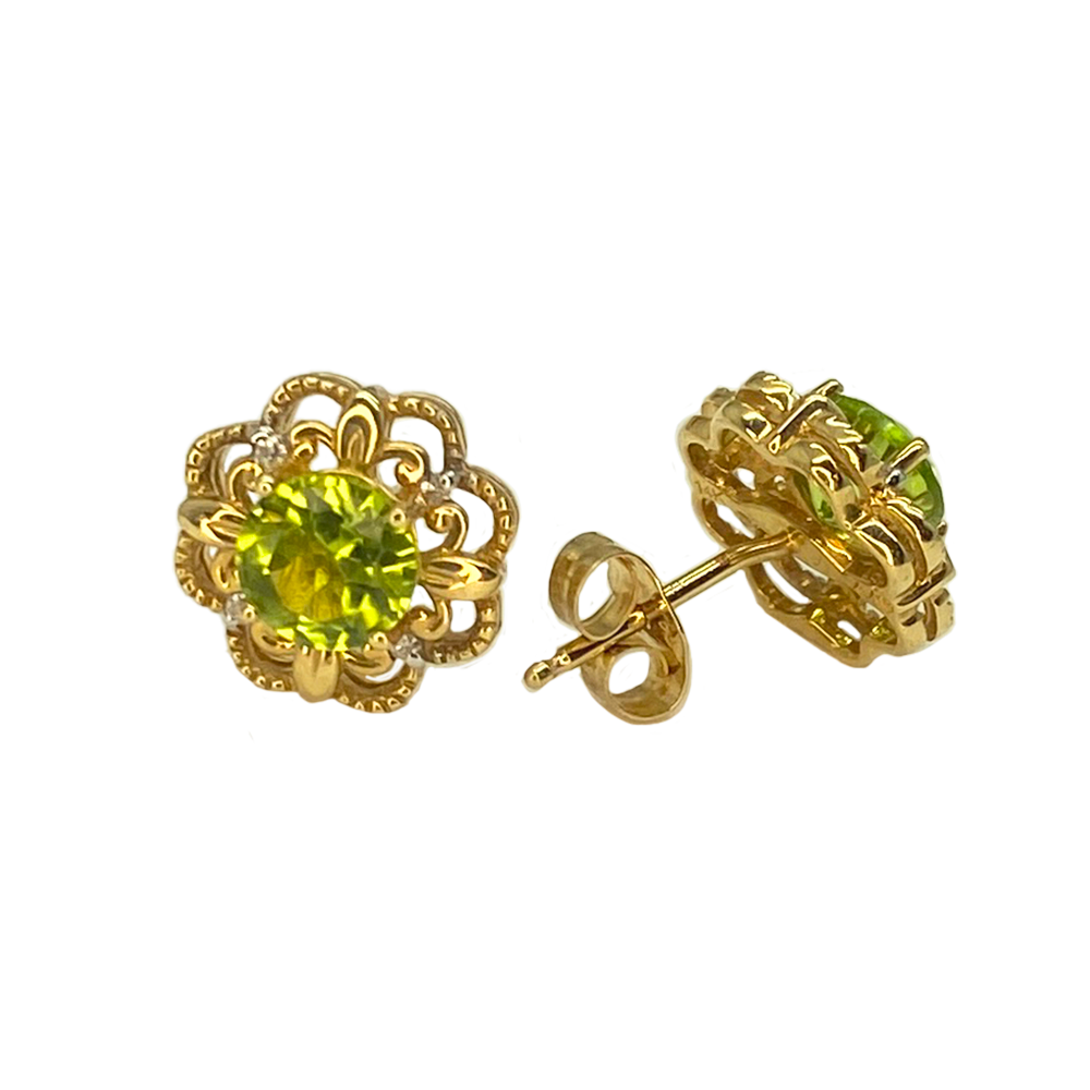 Pair of gold stud earrings featuring a round peridot gemstone in a floral-inspired setting with diamond accents.