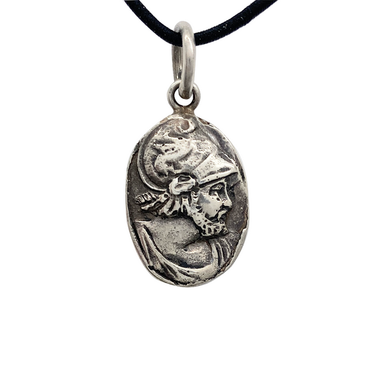 Silver oval pendant featuring the profile of a helmeted warrior with a beard.