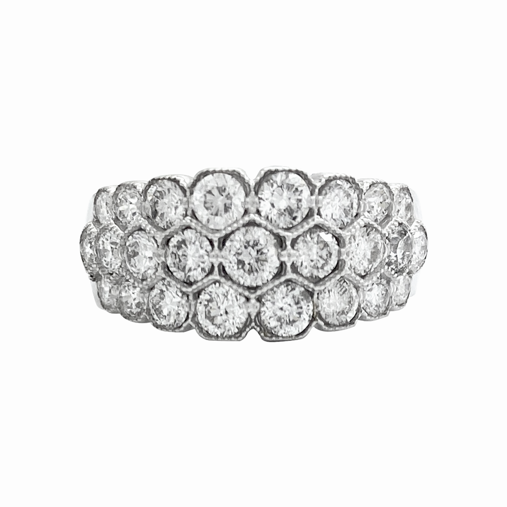 Silver band with three rows of round cut diamonds