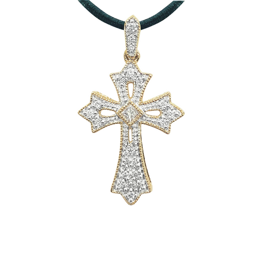 Gold cross pendant with multiple small diamonds in a pave setting, hanging on a black necklace