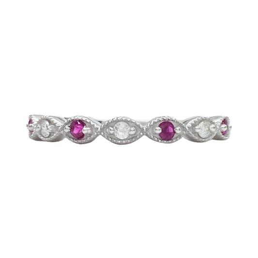 Silver band with alternating oval rubies and diamonds, set in marquise.